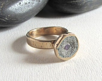 Bronze statement ring with concrete and cubic zirconia