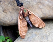 Maple seeds and peridot and vera cruz amethyst