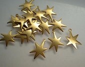 18 small funky brass star charms