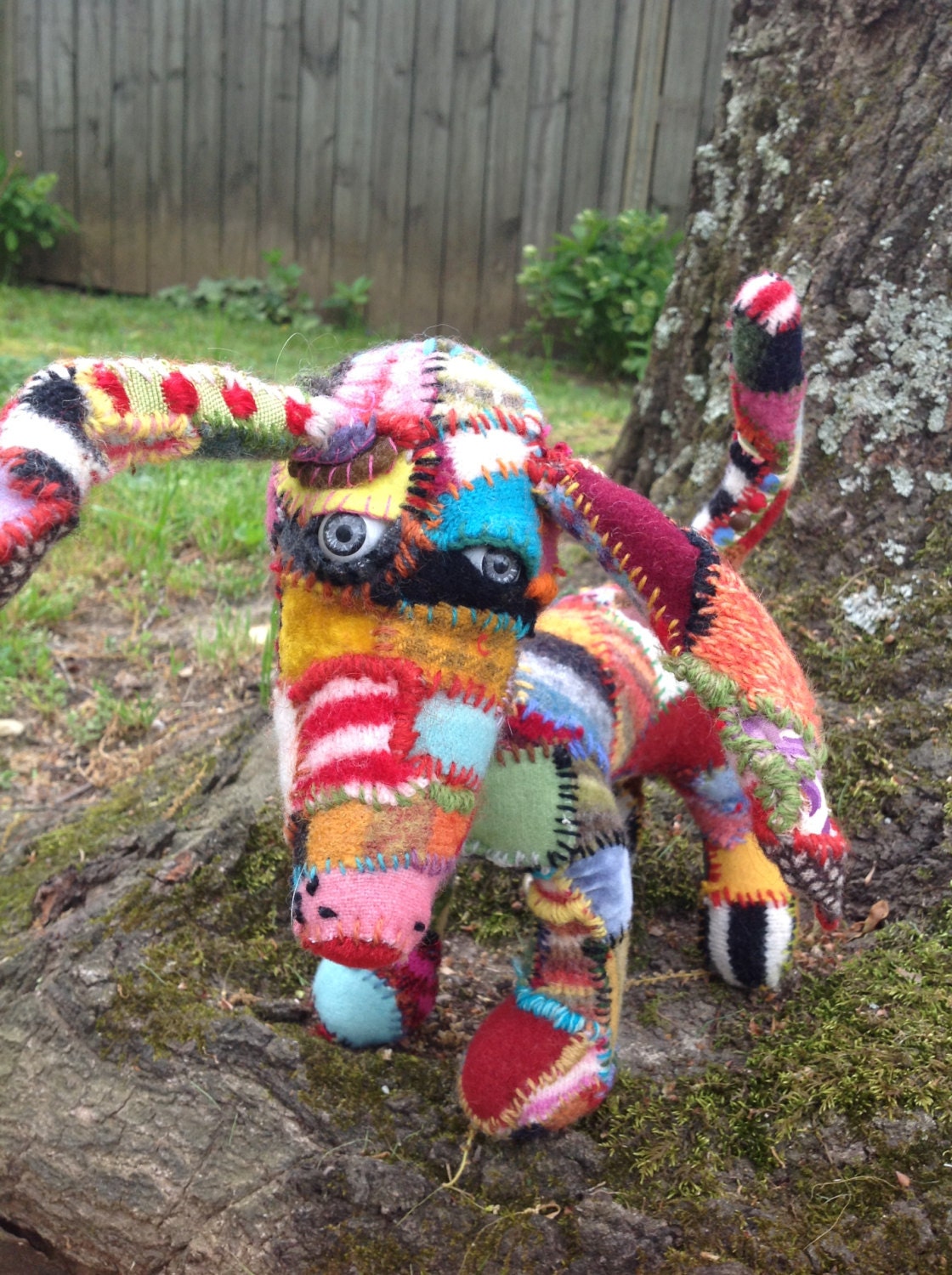 Folk art handmade dog made from recycled felted sweaters