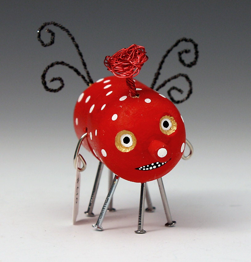 red polka dot tiny neurosis sculpture