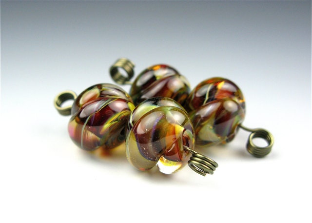 Handmade glass bead pair /  Carved spirals / Bora Bora shifting colors