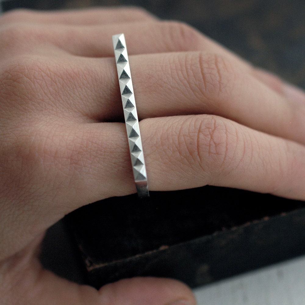 Slicker then ever Minicyn studded knuckle duster