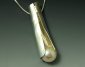 Twisted, Sterling Silver and Freshwater pearl anticlastic necklace, handcrafted artisan jewelry by jewelrybyfrancine on etsy