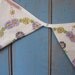 Vintage Tablecloth Bunting.  Main Colour - Off White.  Fabric - has Lovely embroidered details in purple, lilac, yellow and green..