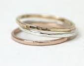 Set of 3 stacking rings in sterling silver and 14Kt yellow and rose gold, skinny hammered rings