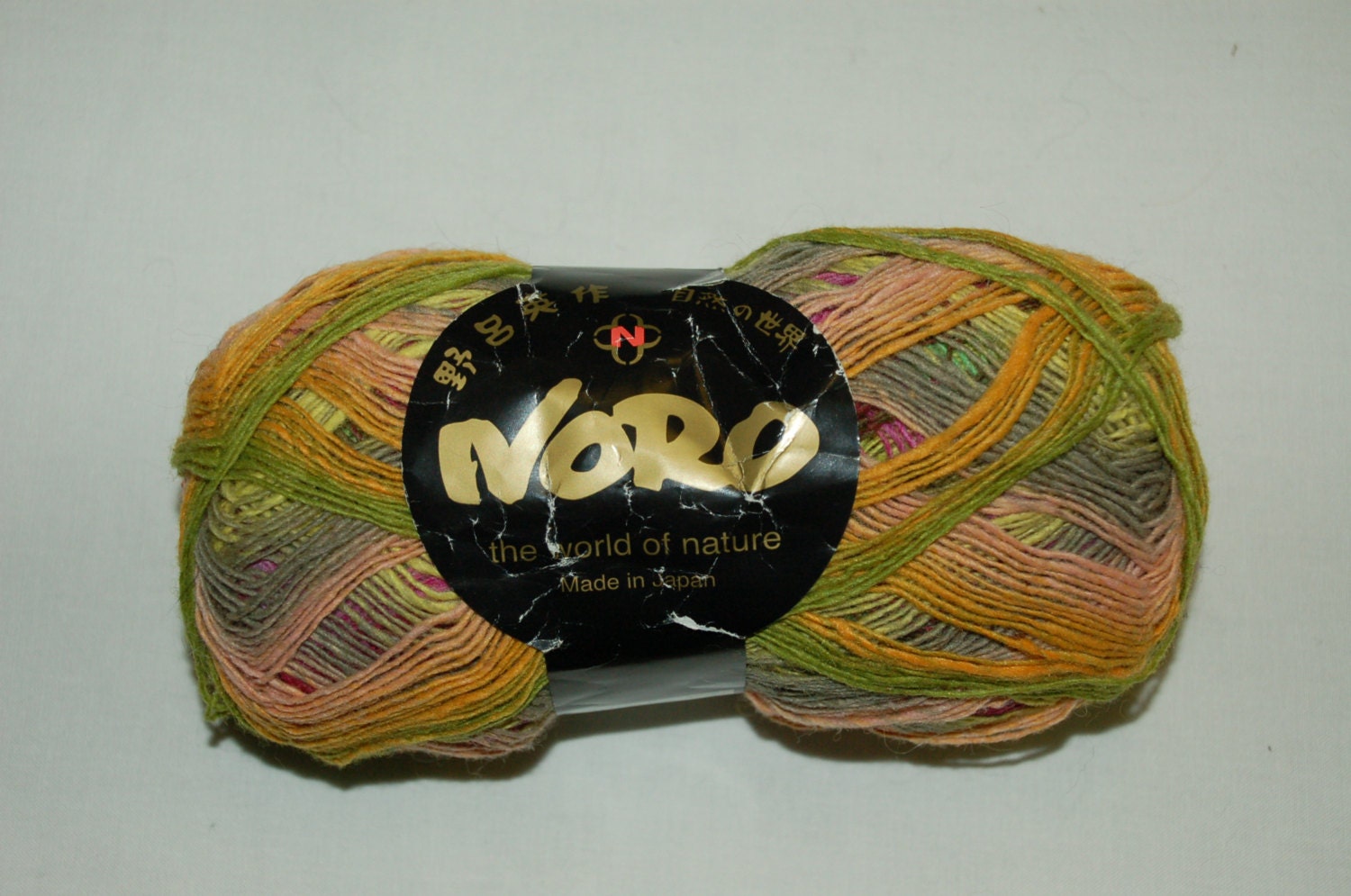 Noro Kureyon Sock Yarn Yellow/green/grey/pink