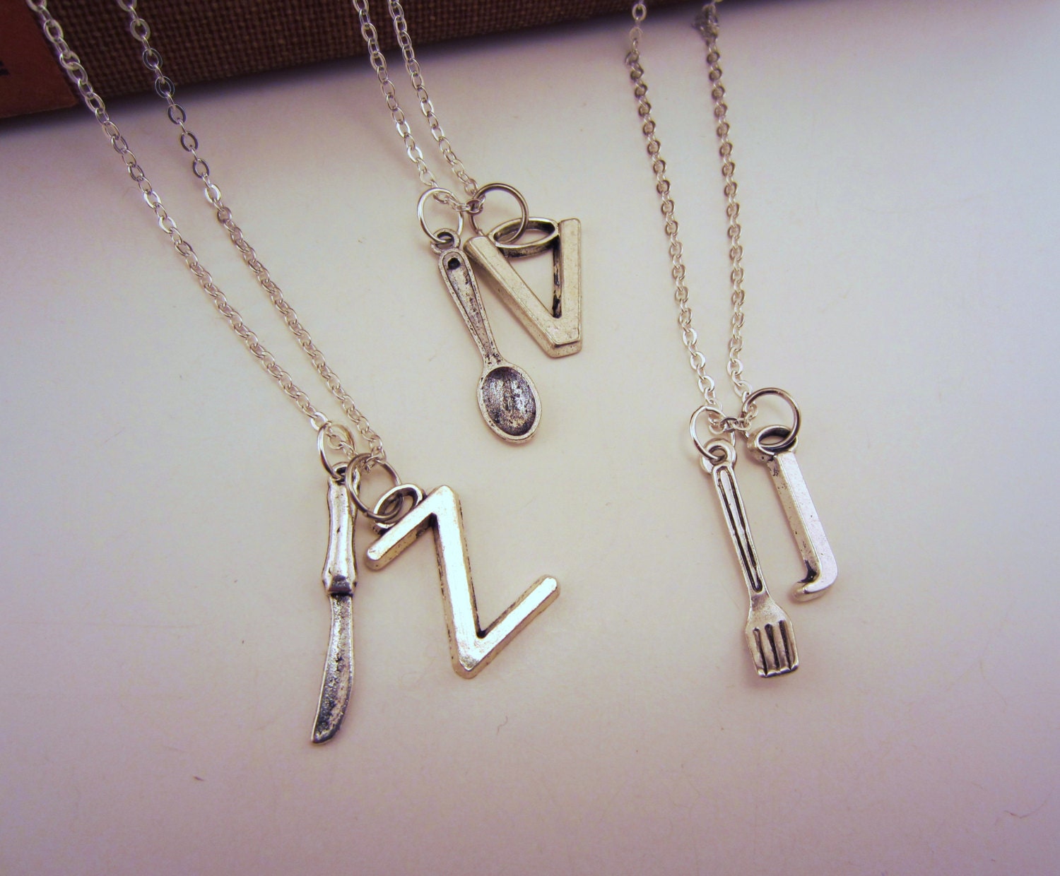Three friendship necklaces. Silver fork, spoon and knife necklaces with personalized initial charms. Cutlery jewelry. Best friend gift.