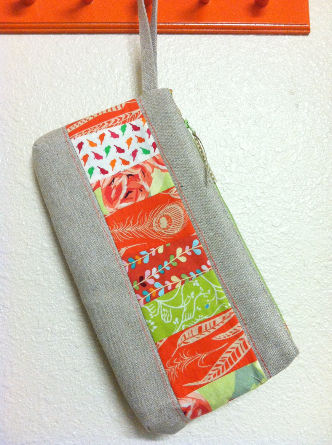 natural linen and orange patchwork wristlet clutch