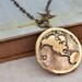 TRAVEL THE WORLD vintage brass locket necklace with world map globe