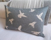 hand printed muted blue humming bird cushion cover