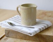 Teeny cafe style pouring jug for milk - hand thrown in stoneware and glazed in pepper yellow