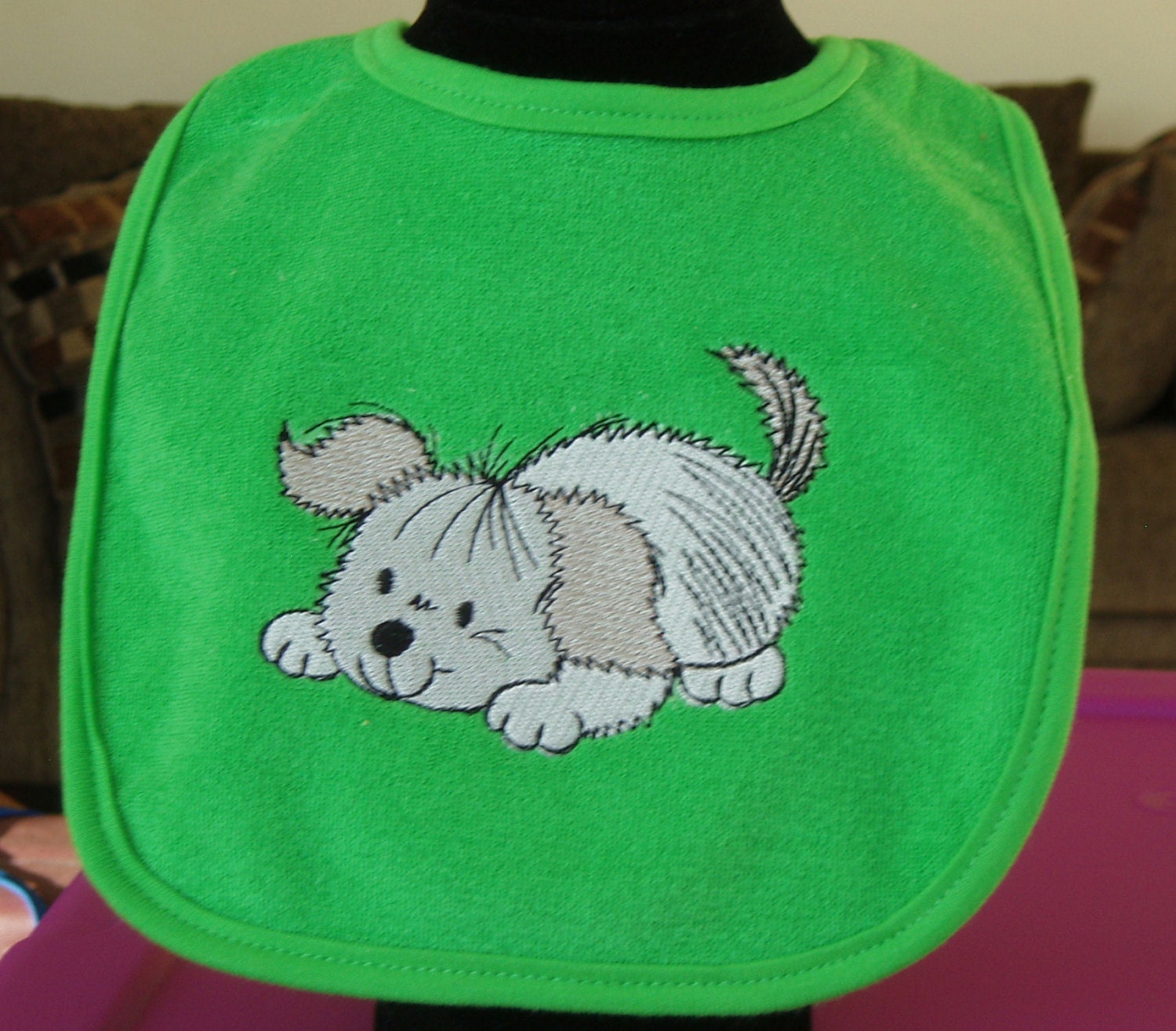 Green Baby Bib with silver playful puppy