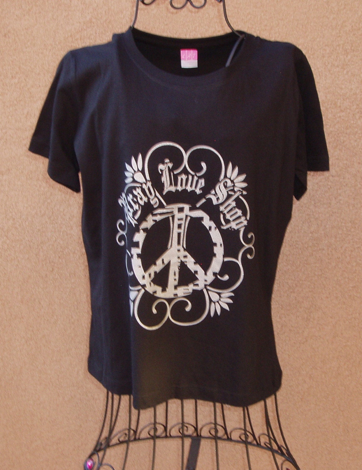 Black tshirt with saying Pray, Love, Shop