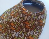 Small Bib in Teeny Tiny Zoo with Light Blue Fleece Backing