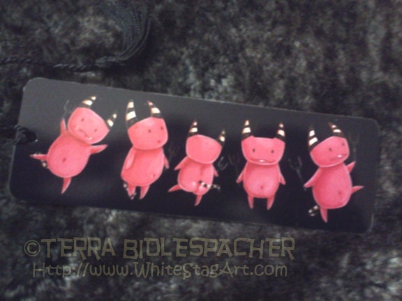 Dancing Devils - Hand crafted laminated bookmark