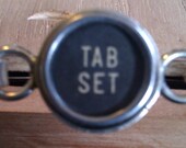 Tab set typewriter key bracelet