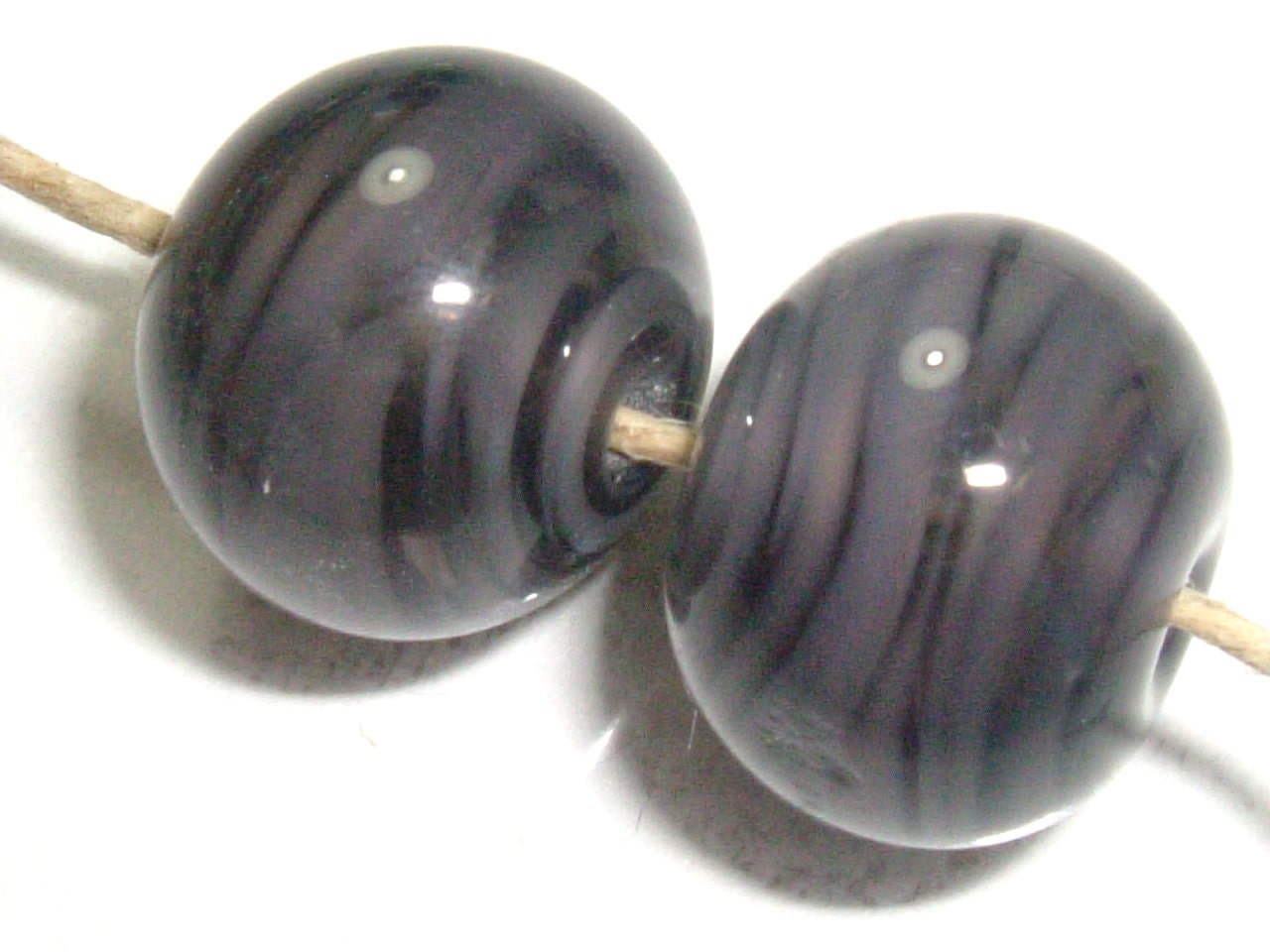 Pair of streaky grey hollow lampwork glass beads SRA P97