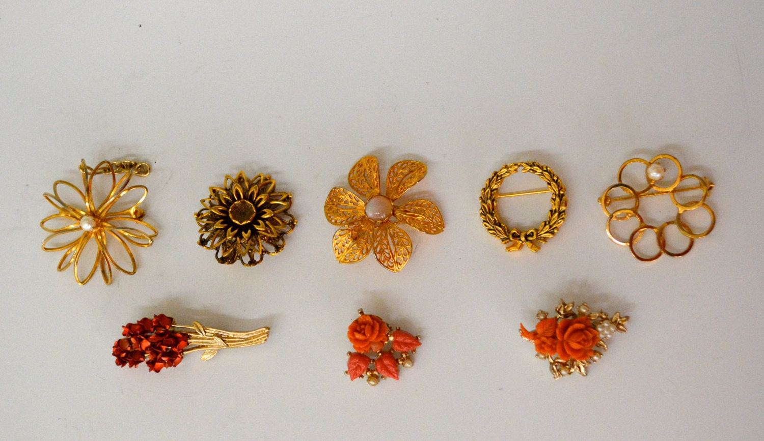 Lot of 8 Floral vintage gold tone pins/brooches