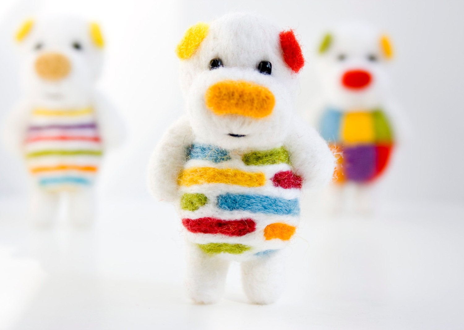 White but colorful felt pocket bear