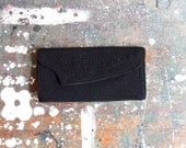 Vintage 1950s black corded clutch