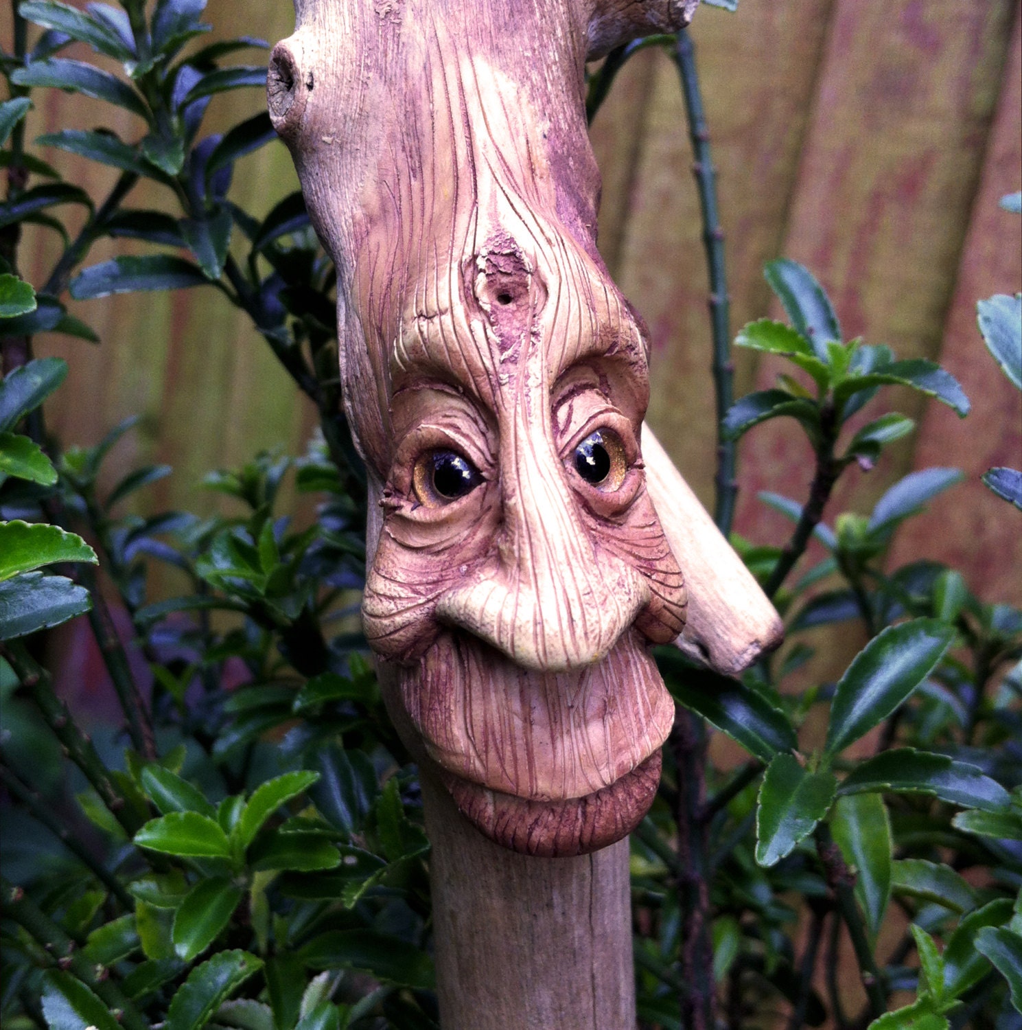 Twog:Wooden face sculpture