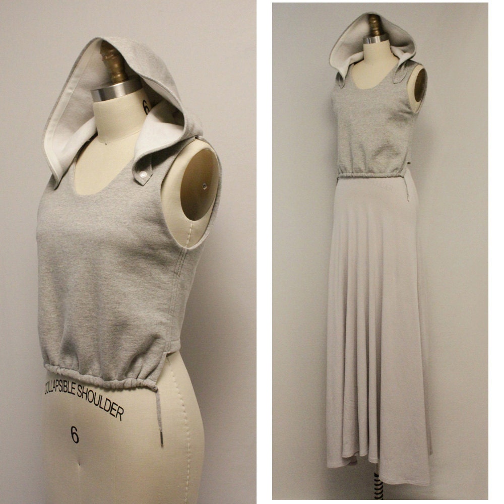 Binary tank with detachable hood