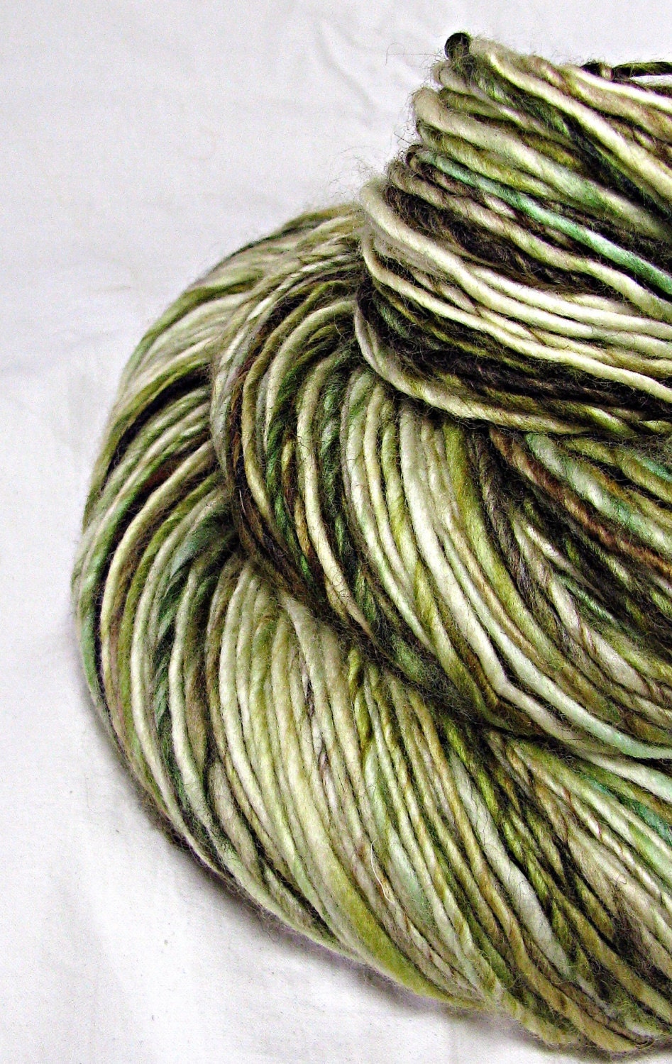 Handspun Yarn Gently Thick and Thin Single Superwash Merino 'Green Tea'