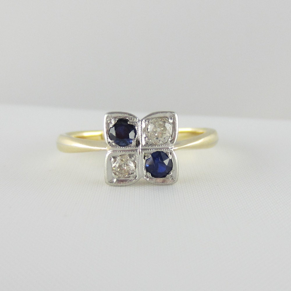 Unique Art Deco Engagment Ring. Diamonds and Sapphires in a Four Stone Setting, 1920s.