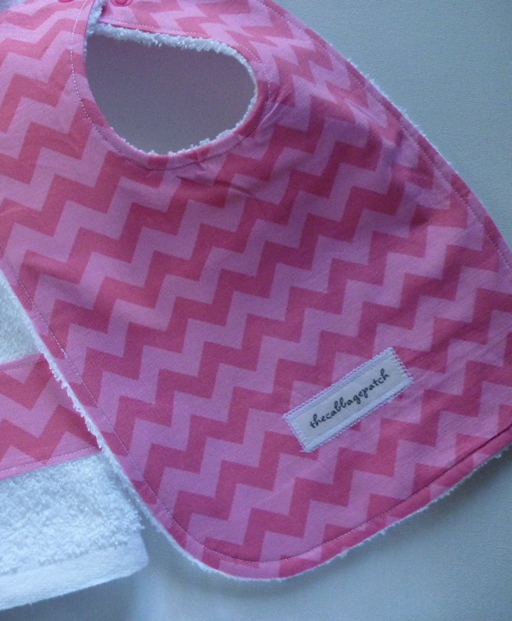 Handmade personalised baby bib adjustable reversible using Chevron pink fabric