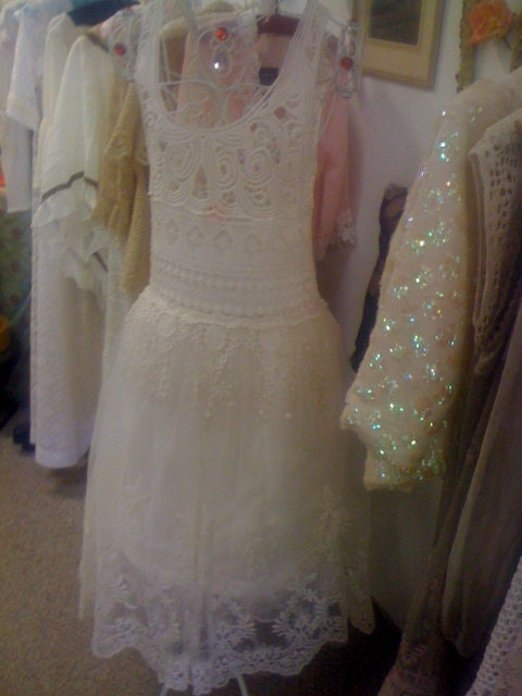 Crochet and lace dress with tassle peplum