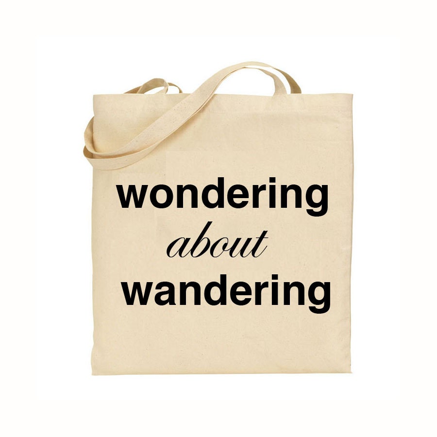 SALE SALE wondering about wandering tote bag - black text