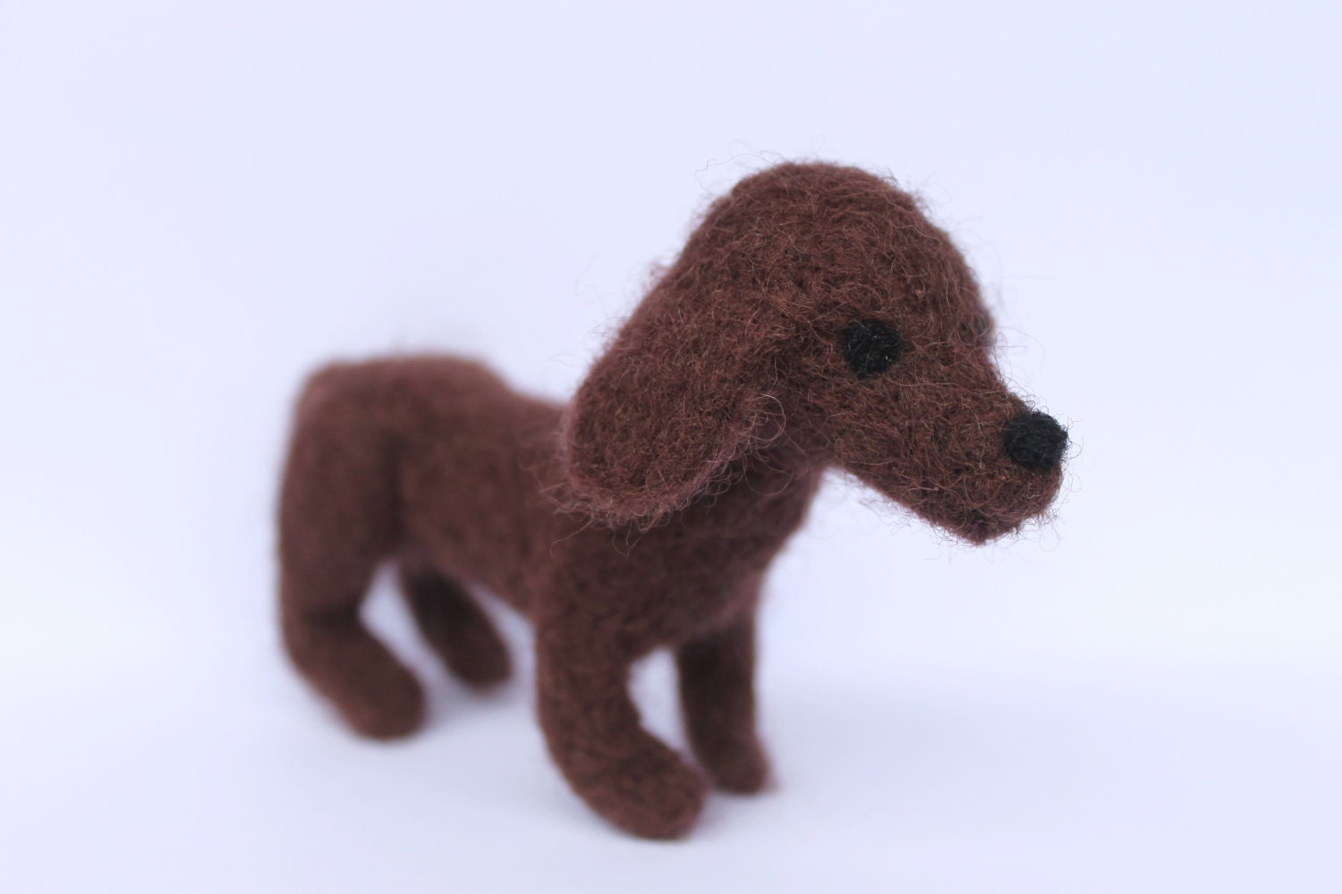 Felted brown dachshund dog