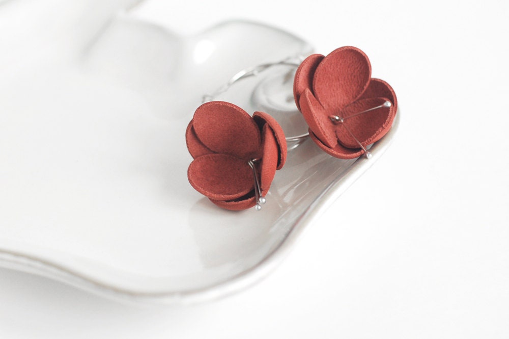 Leather earrings in red orange