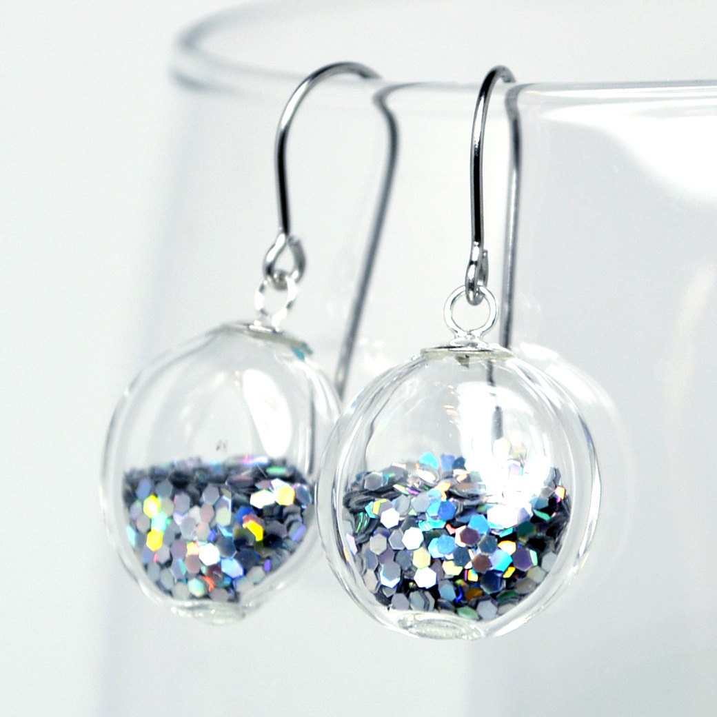 Silver iridescent glitter round blown glass dangle earrings.