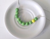 color block bead necklace in green and yellow