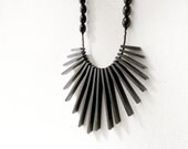 geometric tribal statement necklace with black sticks and beads - contemporary jewelry