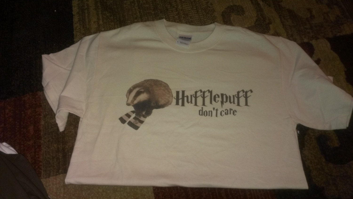 Hufflepuff Don't Care Badger Harry Potter funny tee