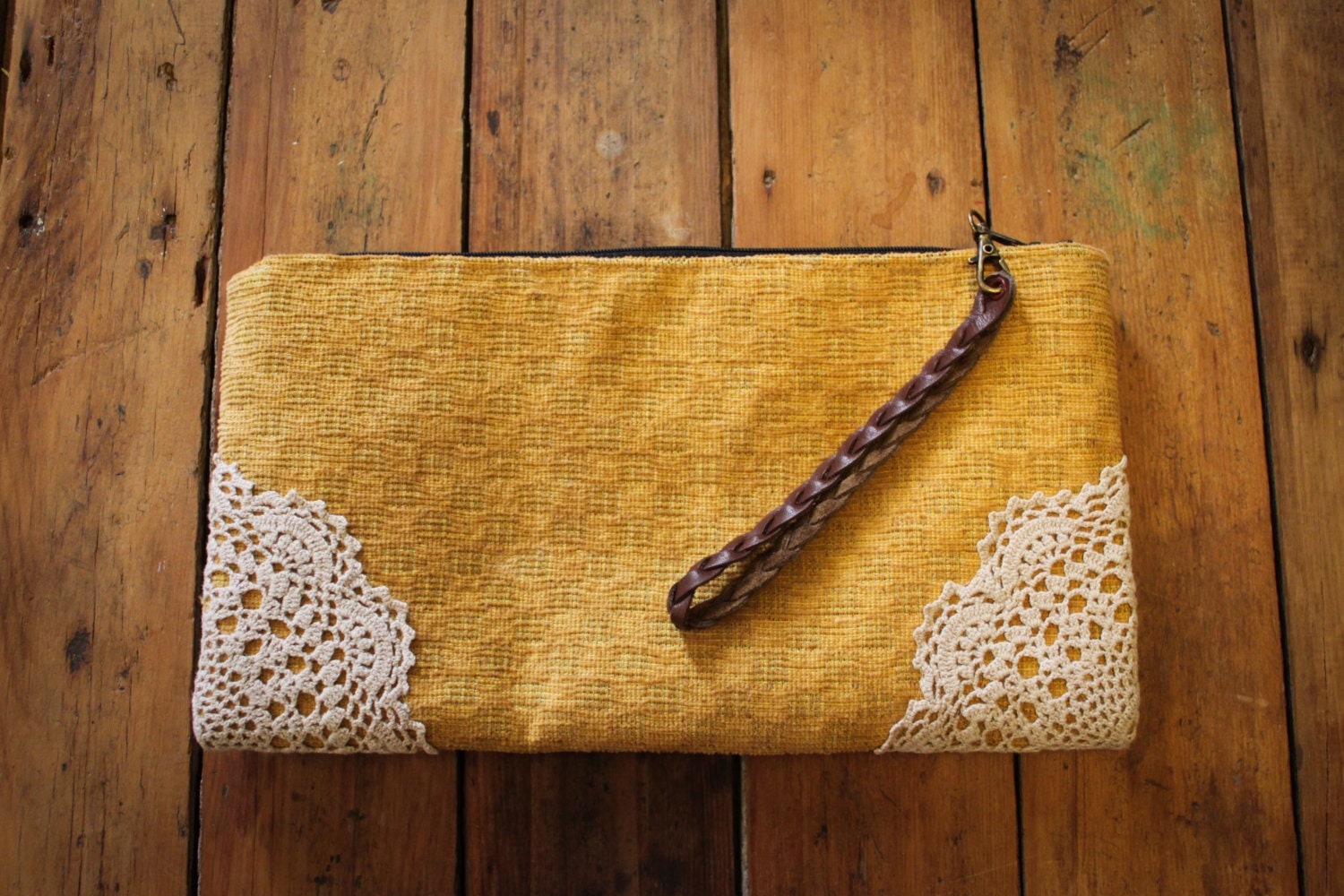 NZFINCH golden yellow clutch with doliy detail, leather handle, zip close, fully lined
