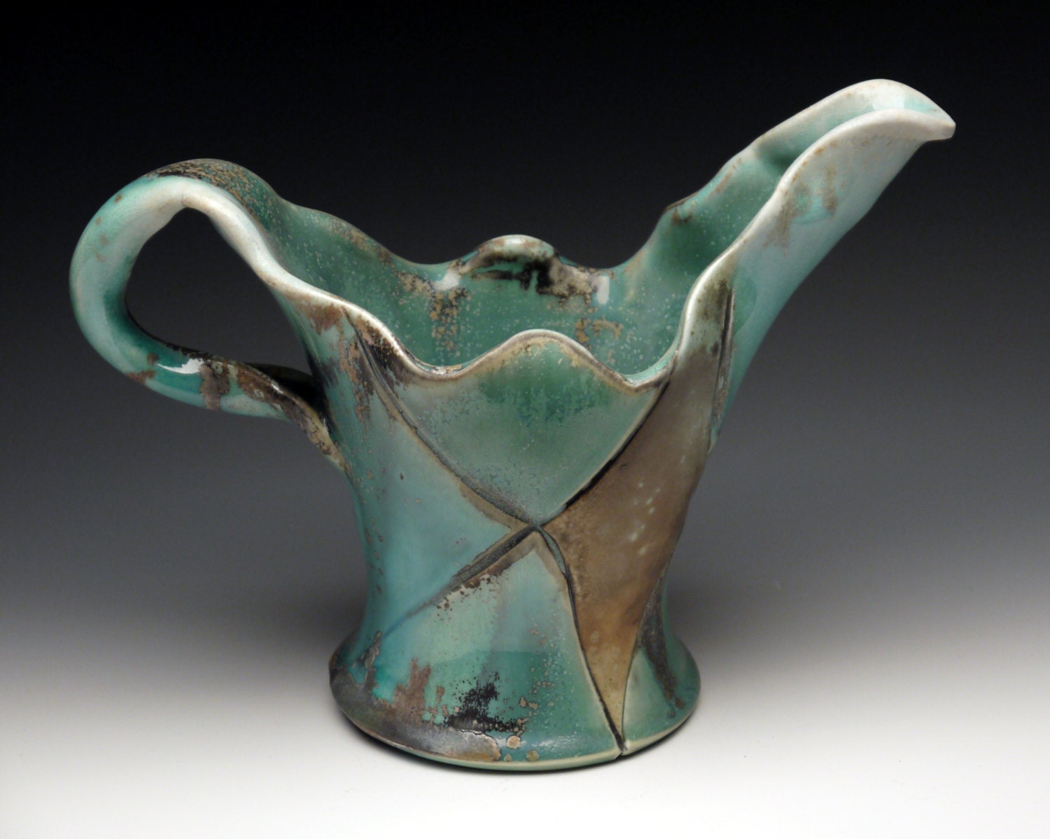 Porcelain Pitcher, woodfired, with Oribe glaze and Avery Flashing Slip