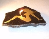 She's the "Hot Mudflap Girl" Firestone/Granite Oil Candle
