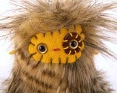 Featherino the plush monster miniature brown and golden yellow stuffed animal