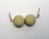 Pair of handmade ceramic button beads in matt green/aqua