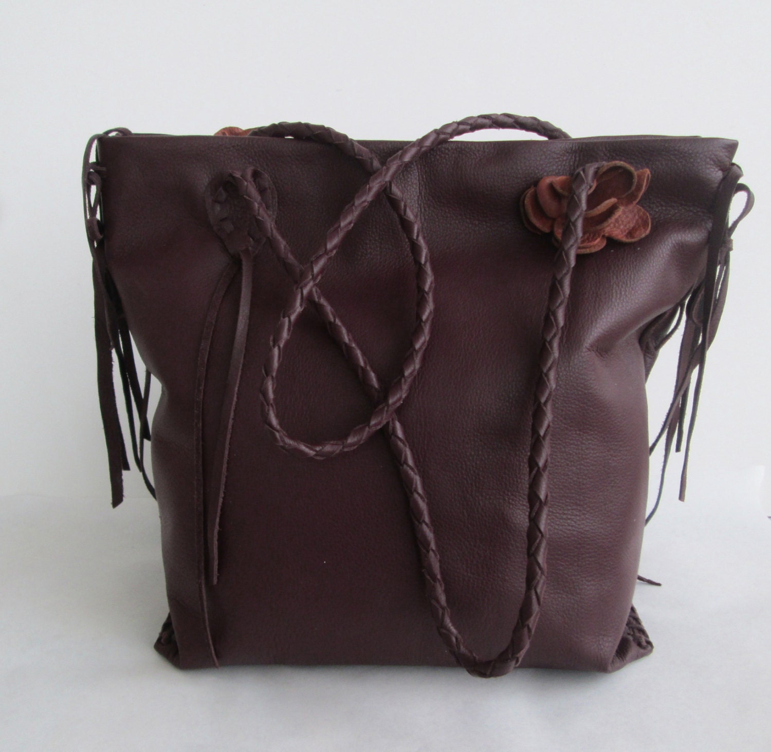 brown leather  handbag tote zippered, with braided strap,  flowers and fringe by Tuscada. Ready to ship.