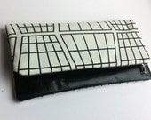 Limited edition multi style leather clutch bag with monochrome print fabric