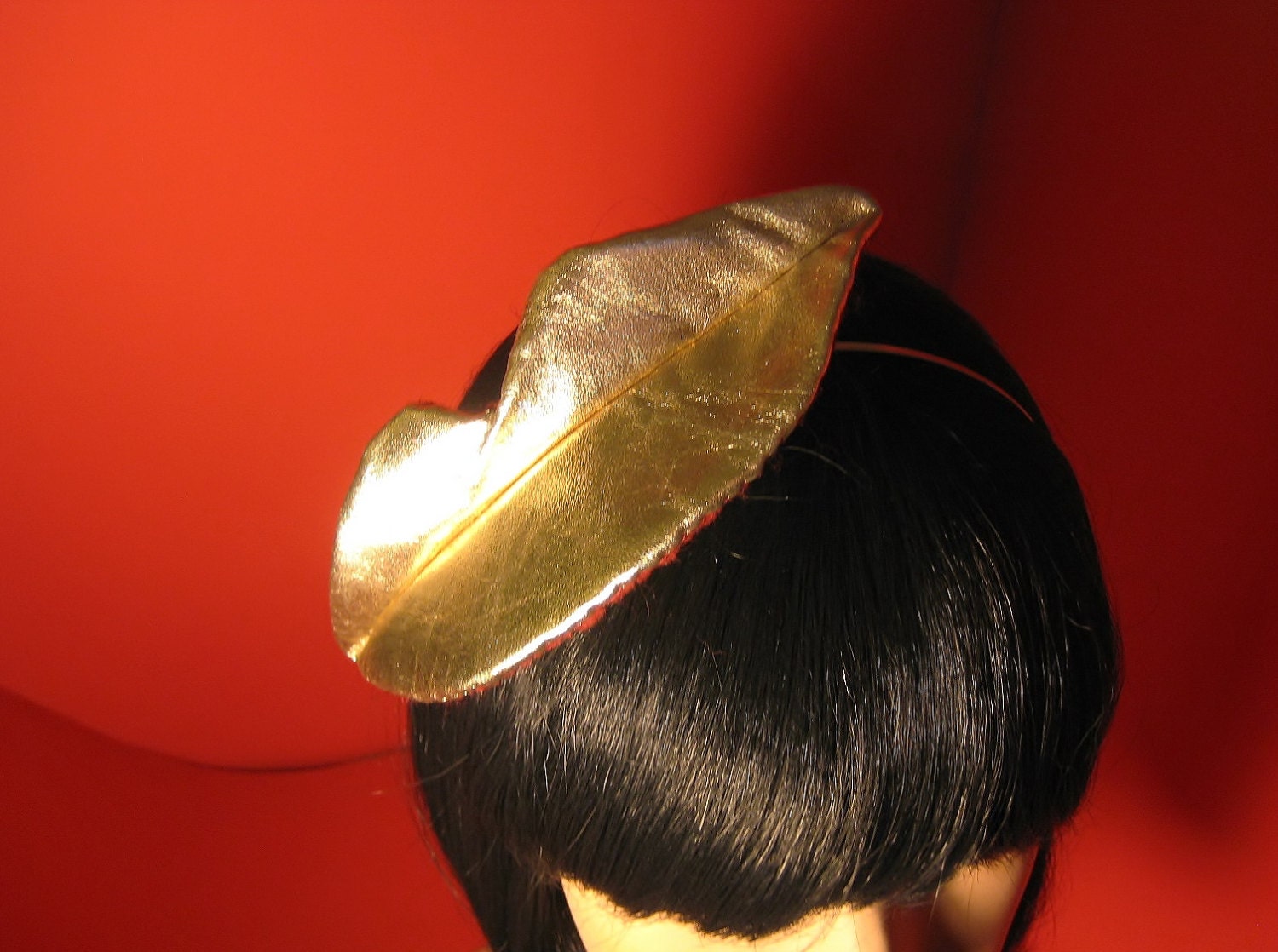 Flirt Kiss Me Fascinator in Gold Faux Leather