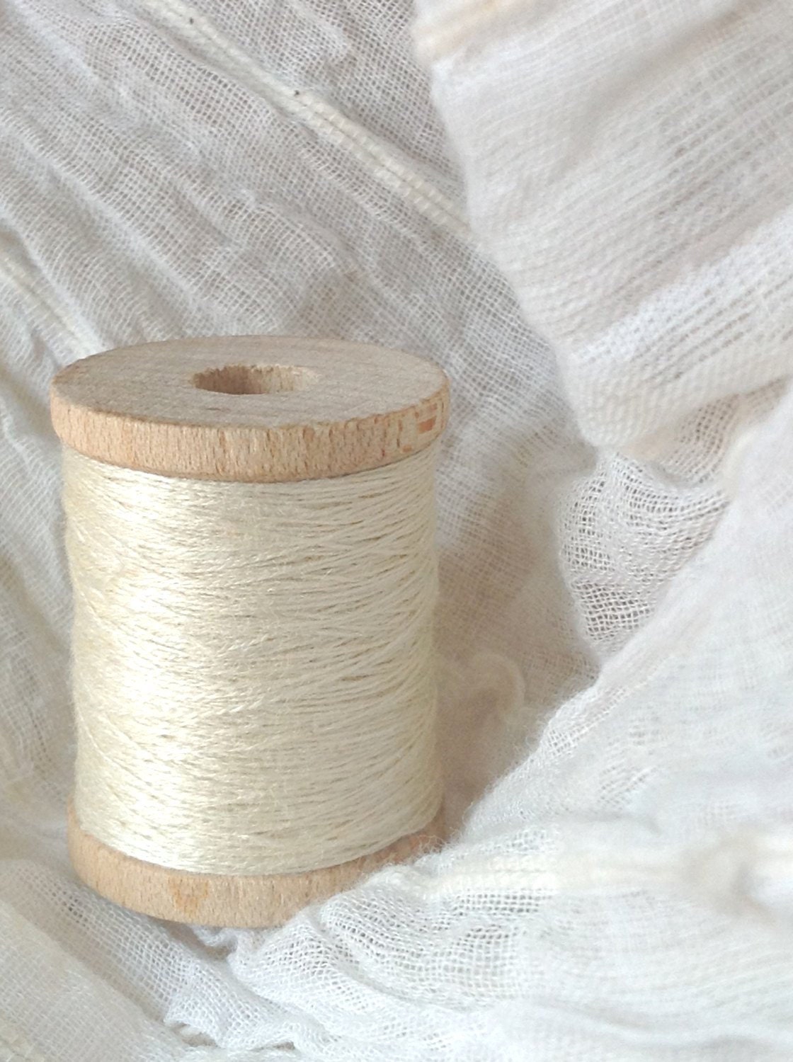 Silk thread. Eri silk. 2/60 count. 100 Yards Wood Bobbin. Milky White Color. 2 ply silk thread