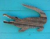 Wooden aligator art,  made of recycled fence wood. gator, outdoor art