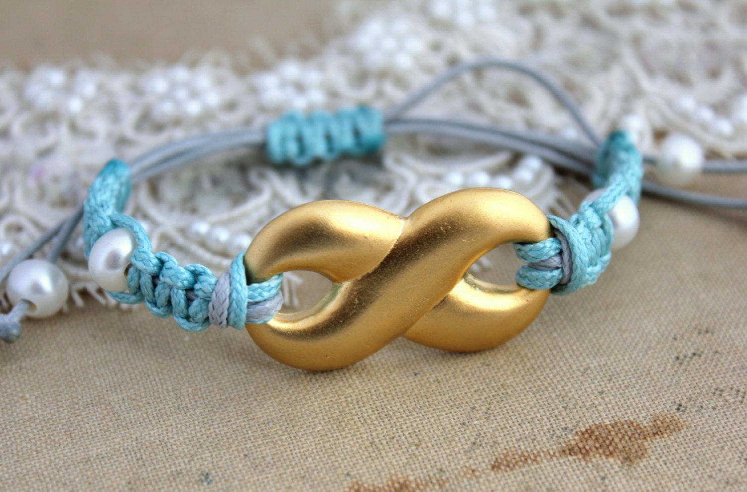 Infinity Friendship bracelet Tiffany blue14 k coated braided bracelet with Pearls