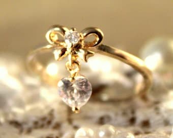 Gold bow and hearts crystal ring - 14 k goldfield .